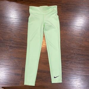 Nike Light Green Tight Fit Cropped Leggings